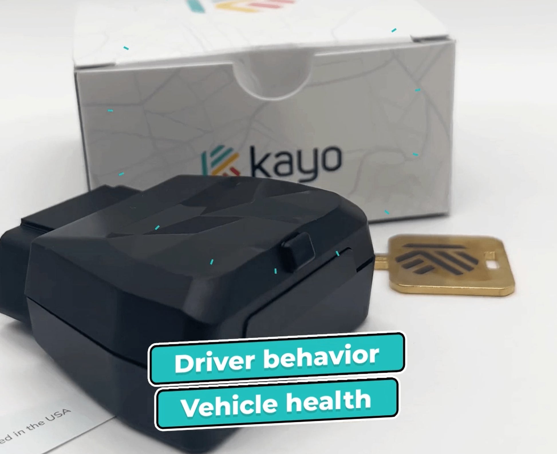 The rear view of the unboxed Kayo GPS tracker and key